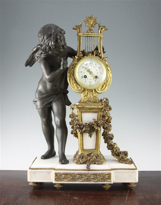 An early 20th century French bronze and ormolu mantel clock, 24in.